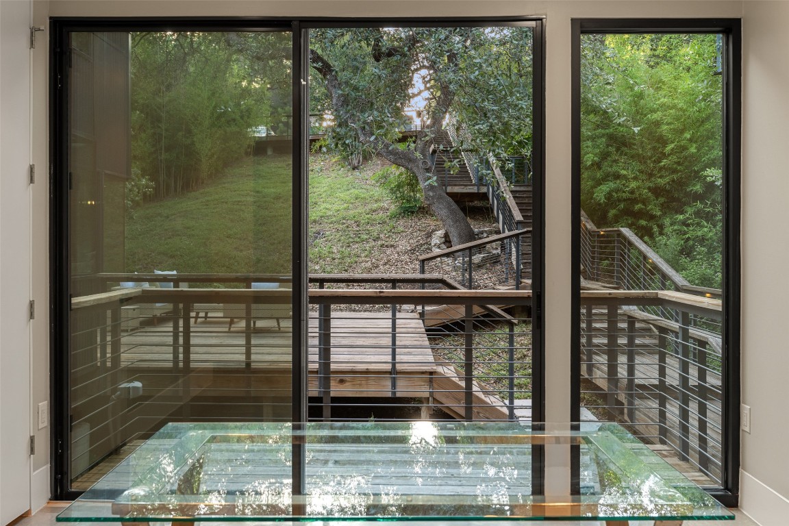 1327 Bonham Terrace, Unit B Austin, TX 78704 - Photo 31 of 40 a view of a balcony with a tree