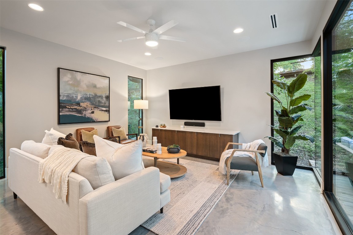 1327 Bonham Terrace, Unit B Austin, TX 78704 - Photo 5 of 40 a living room with furniture and a flat screen tv