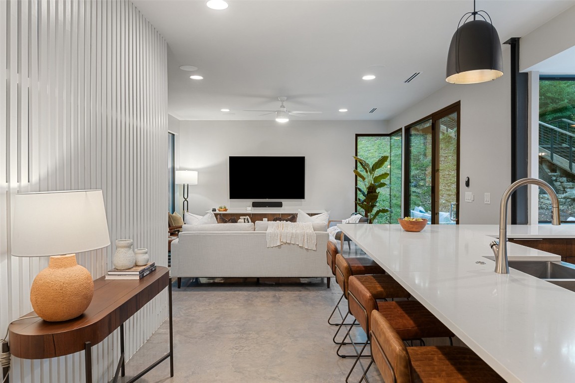 1327 Bonham Terrace, Unit B Austin, TX 78704 - Photo 6 of 40 a living room with furniture and a flat screen tv