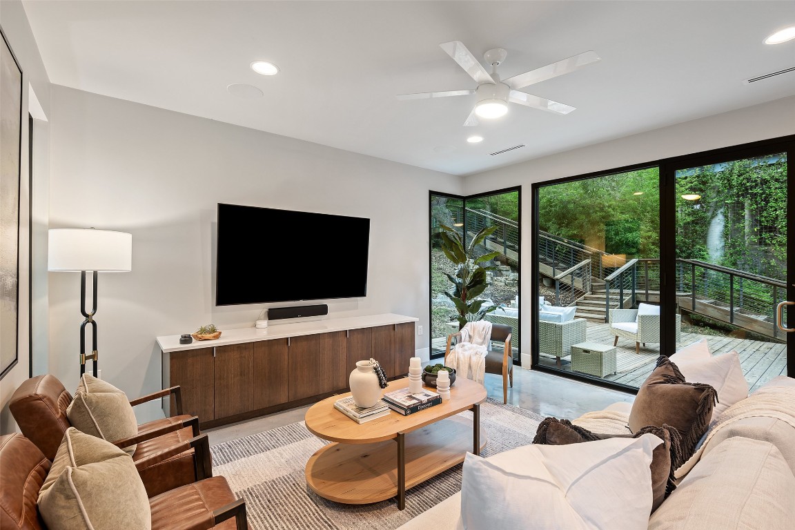 1327 Bonham Terrace, Unit B Austin, TX 78704 - Photo 9 of 40 a living room with furniture and a flat screen tv