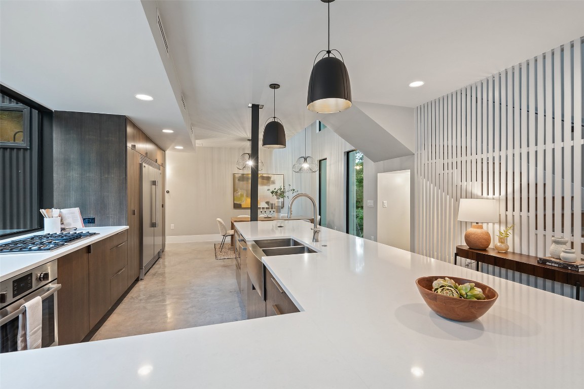 1327 Bonham Terrace, Unit B Austin, TX 78704 - Photo 10 of 40 a large kitchen with a table and chairs