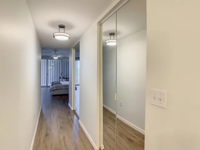 a view of a balcony with an outdoor seating