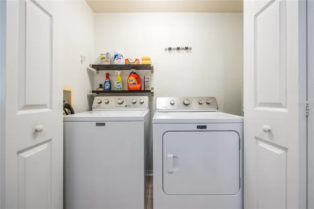 a view of a balcony with wooden floor