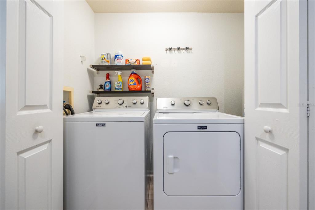 4850 Southwest 91 Terrace, Unit P201 Gainesville, FL 32608 - Photo 31 of 33 a utility room with dryer and washer