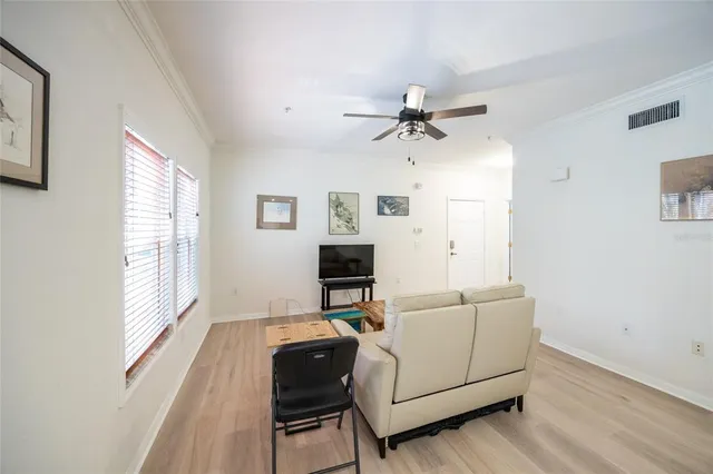 a kitchen with a table and chairs in it