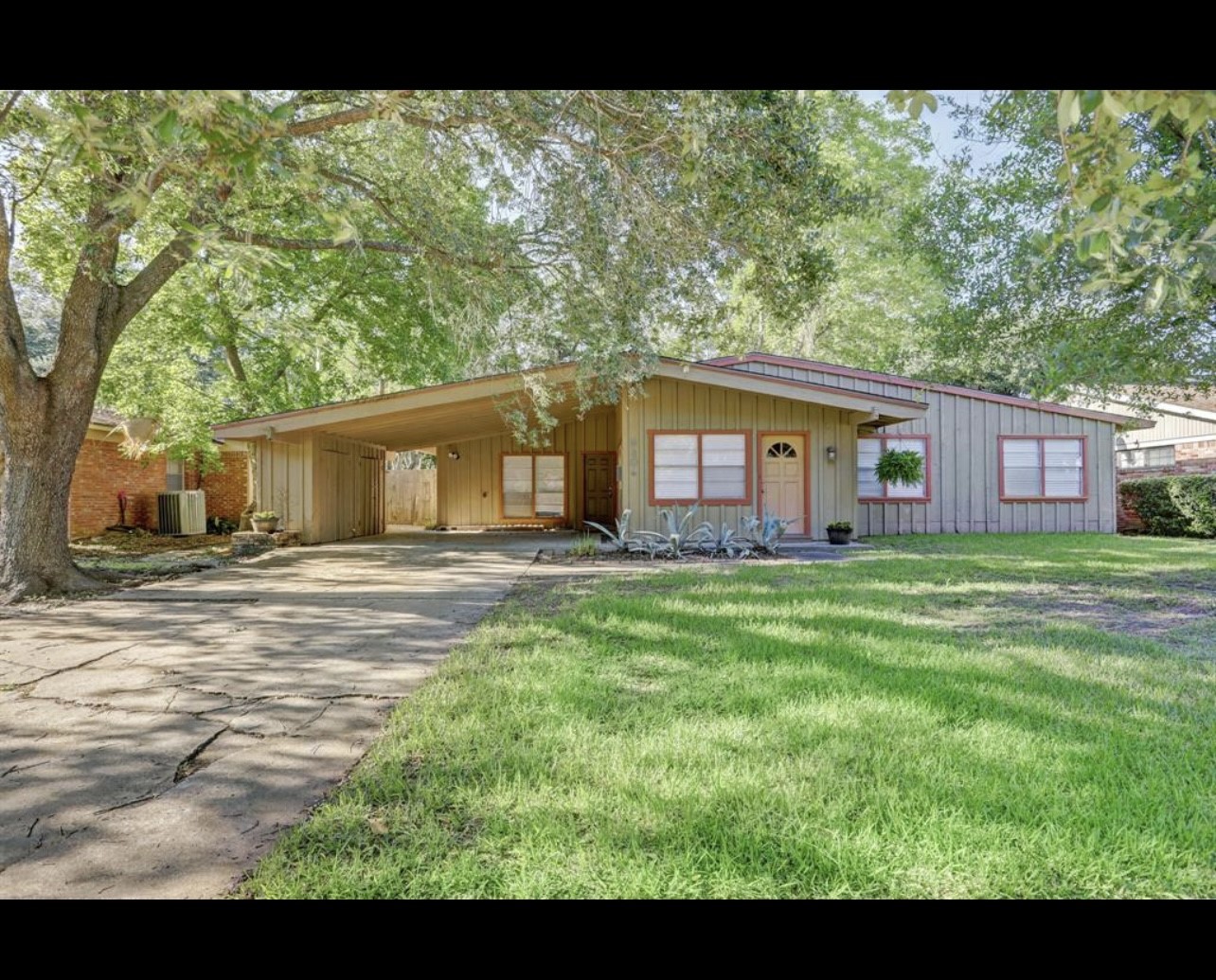 5406 Carew Street Houston, TX 77096 - Photo 1 of 18 a view of a house with a backyard