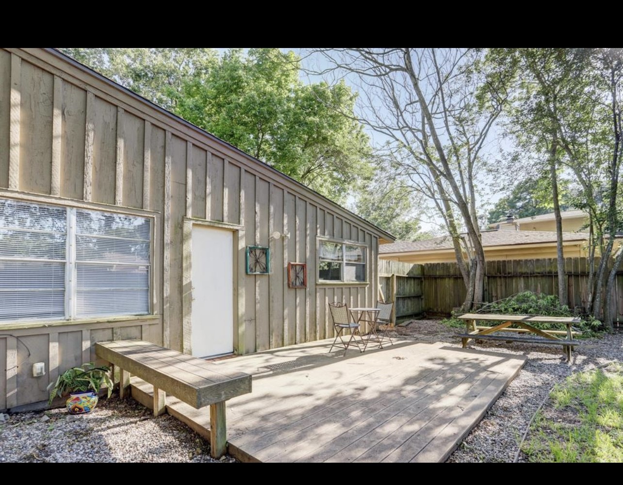 5406 Carew Street Houston, TX 77096 - Photo 4 of 18 a view of backyard with a patio