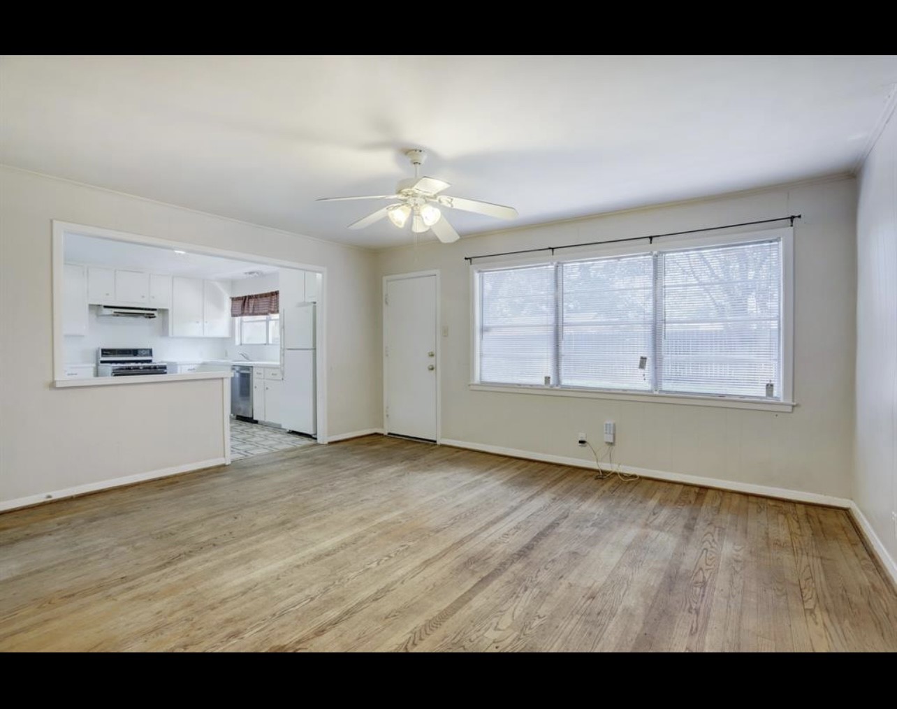5406 Carew Street Houston, TX 77096 - Photo 5 of 18 a view of an empty room with window