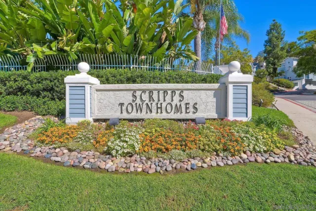 a sign on the side of the road