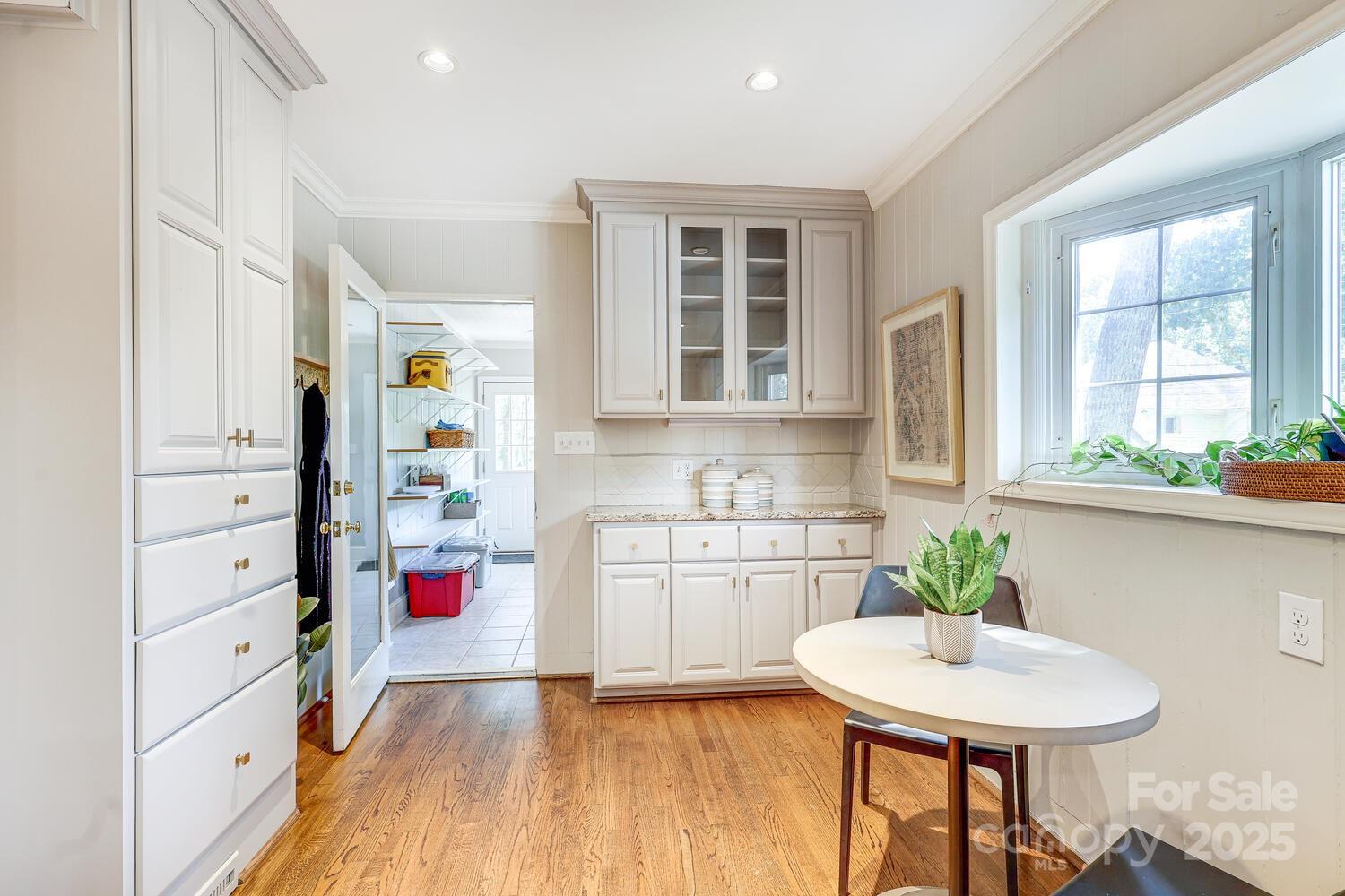 500 Ellsworth Road Charlotte, NC 28211 - Photo 14 of 40 a kitchen with stainless steel appliances granite countertop a sink and a refrigerator