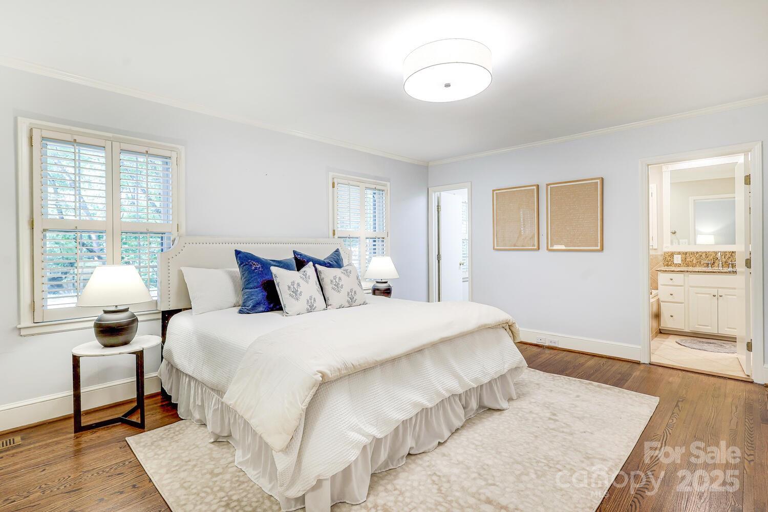 500 Ellsworth Road Charlotte, NC 28211 - Photo 22 of 40 a bedroom with a large bed and a couch