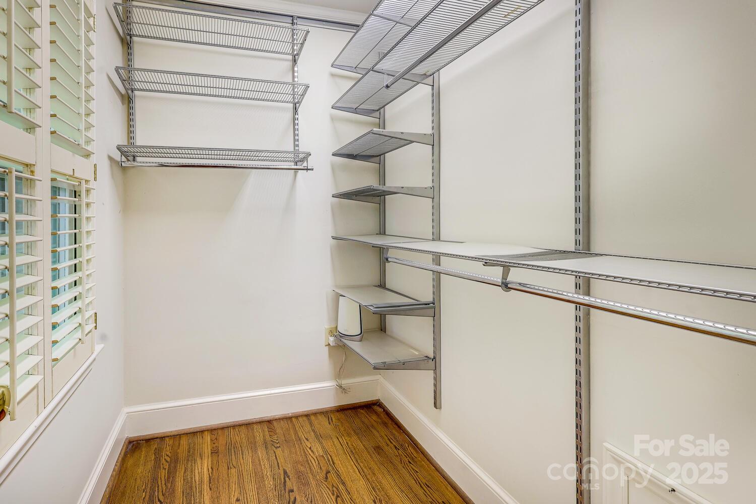 500 Ellsworth Road Charlotte, NC 28211 - Photo 25 of 40 a view of walk in closet with empty racks