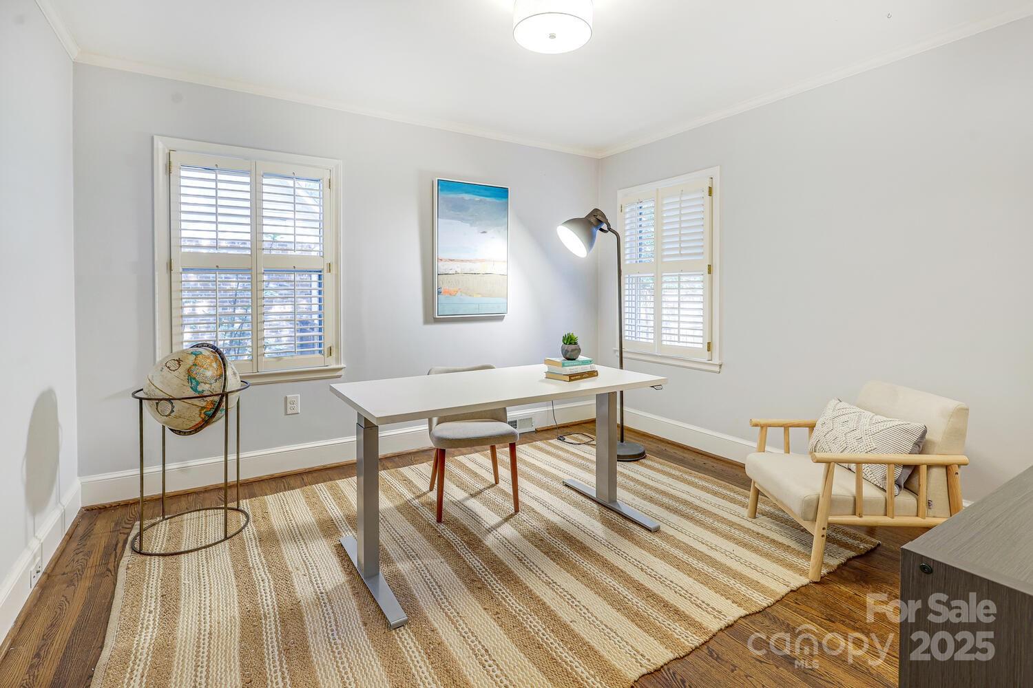500 Ellsworth Road Charlotte, NC 28211 - Photo 26 of 40 a view of a livingroom with furniture and wooden floor