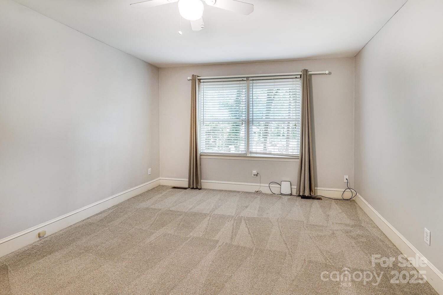 500 Ellsworth Road Charlotte, NC 28211 - Photo 30 of 40 an empty room with windows
