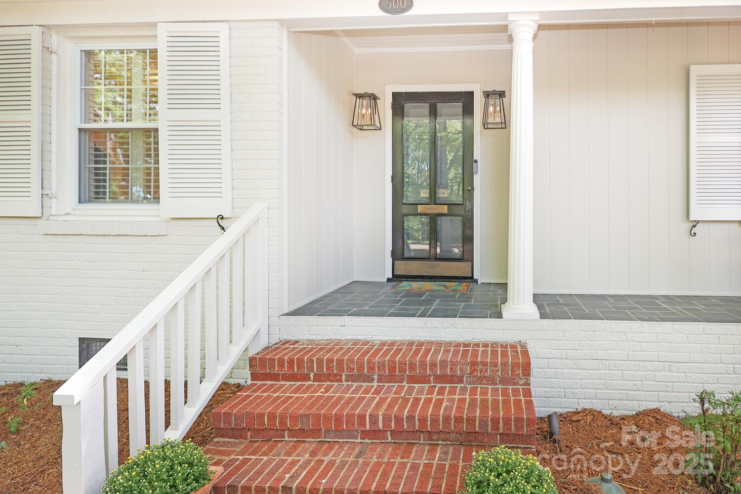 500 Ellsworth Road Charlotte, NC 28211 - Photo 3 of 40 a bedroom with a bed and a window