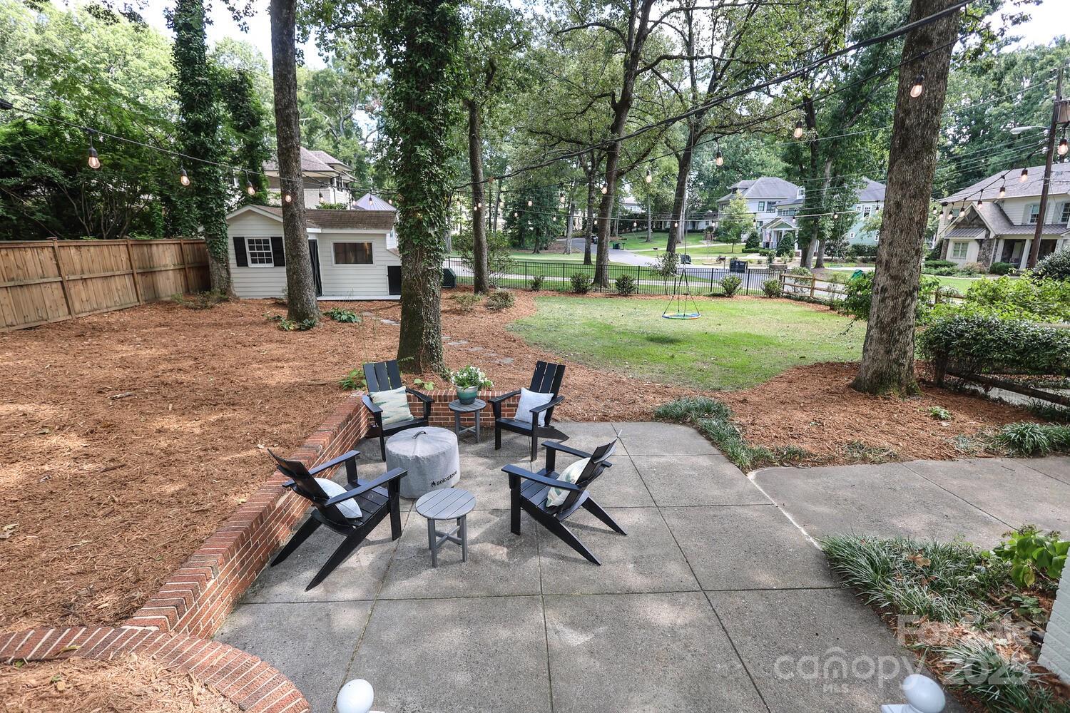 500 Ellsworth Road Charlotte, NC 28211 - Photo 33 of 40 a view of a backyard with sitting area