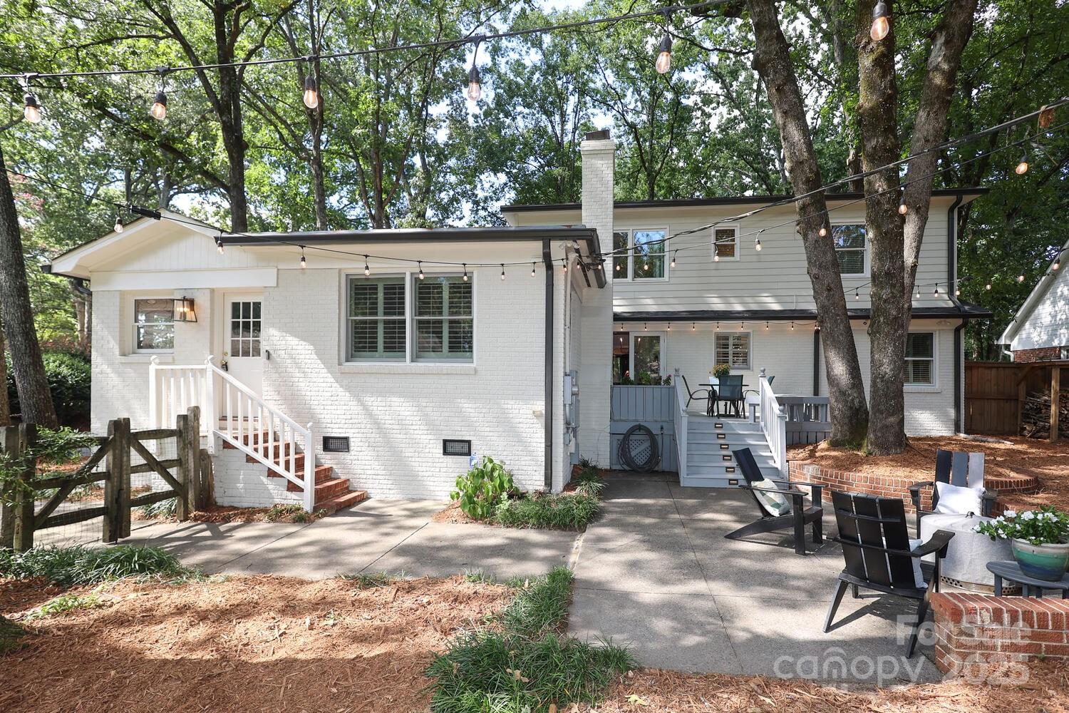 500 Ellsworth Road Charlotte, NC 28211 - Photo 38 of 40 a view of a house with backyard and sitting area