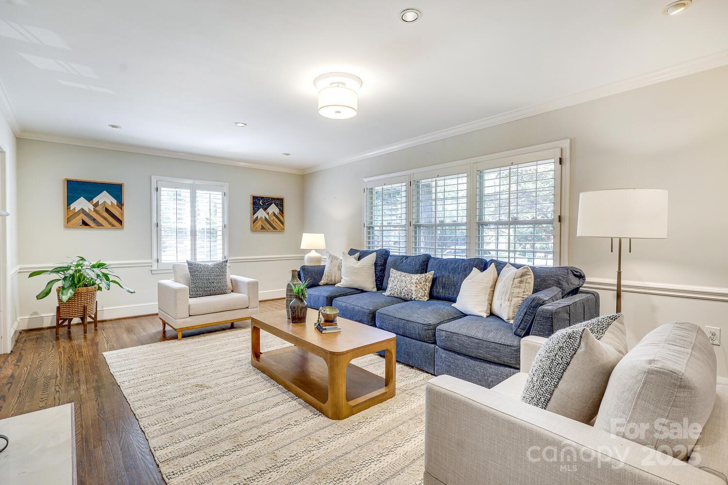 500 Ellsworth Road Charlotte, NC 28211 - Photo 5 of 40 a living room with furniture and a large window