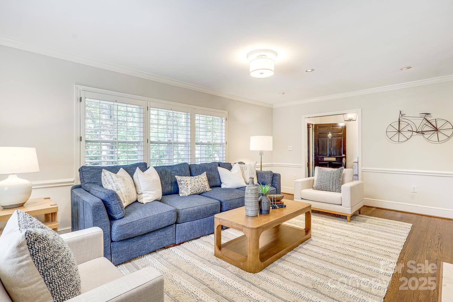 500 Ellsworth Road Charlotte, NC 28211 - Photo 6 of 40 a living room with furniture and a large window