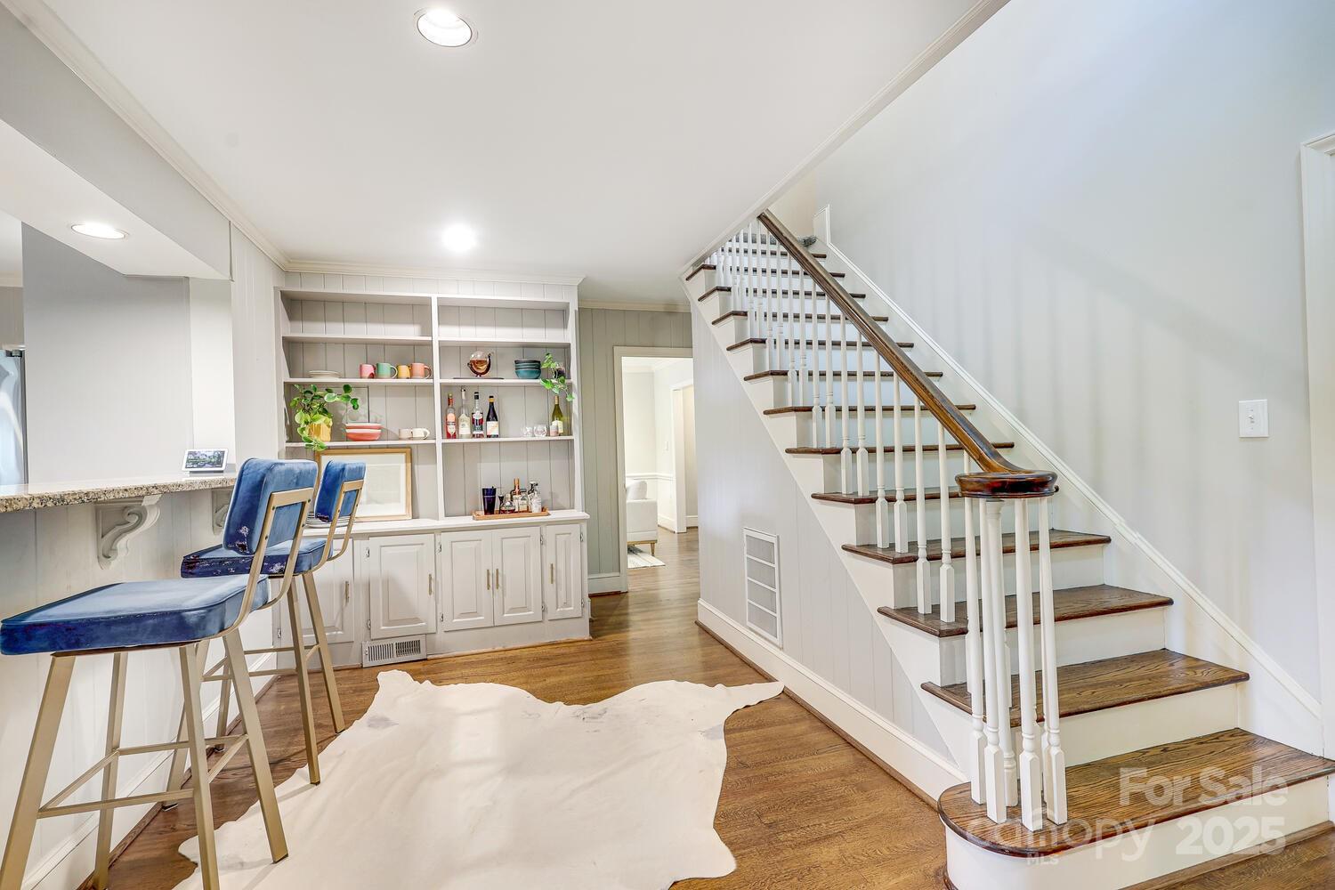 500 Ellsworth Road Charlotte, NC 28211 - Photo 8 of 40 a view of entryway and hall with wooden floor