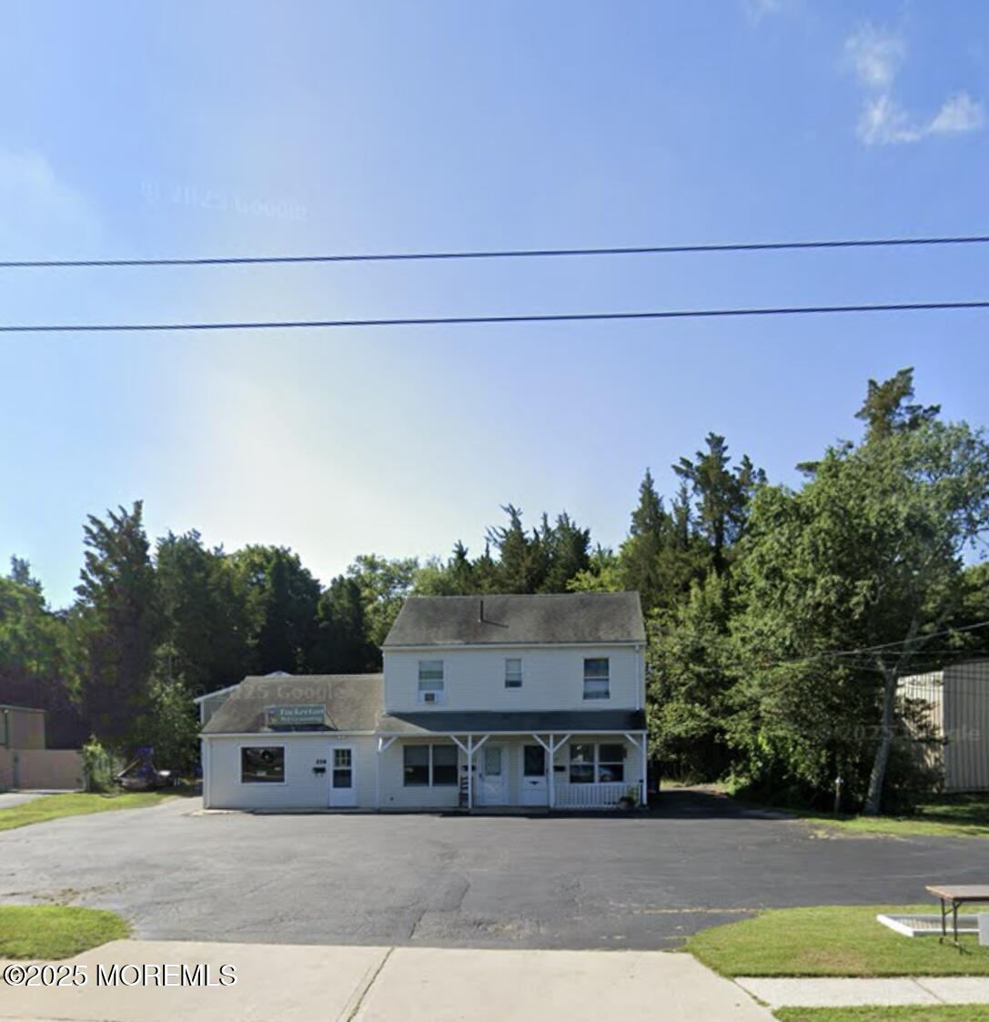 Main Street, Unit C Tuckerton, NJ 08087 - Photo 2 of 19 a car parked on the side of the road