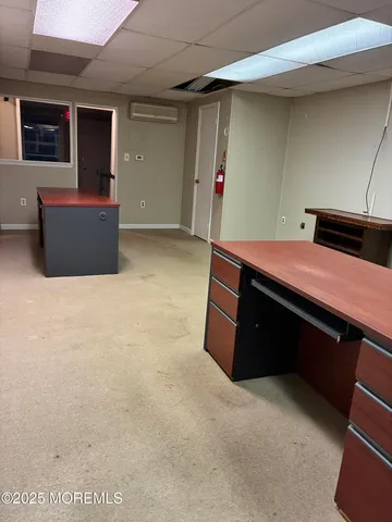 a room with furniture and storage