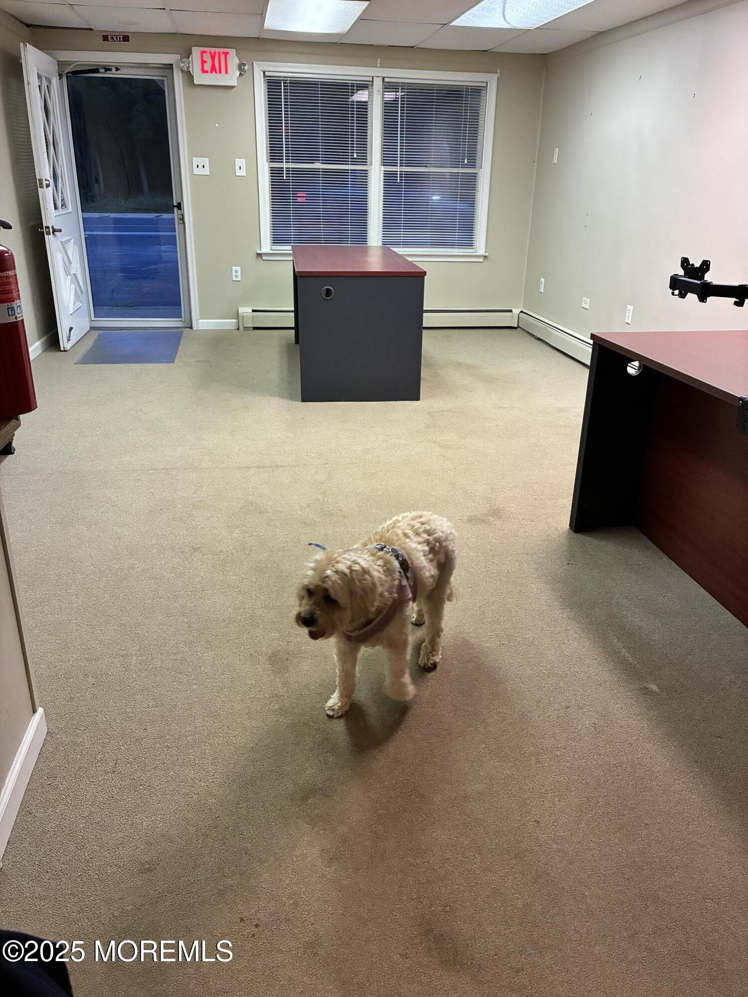 Main Street, Unit C Tuckerton, NJ 08087 - Photo 6 of 19 a view of a livingroom with furniture and cabinet