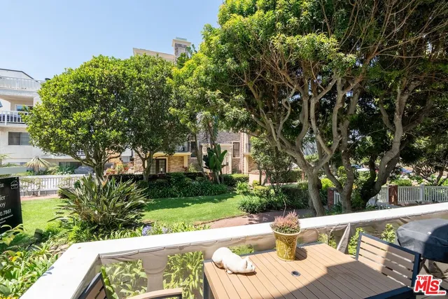 a patio with water view of lake view