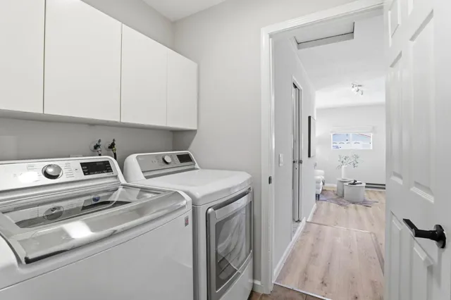 a view of utility room with washer and dryer