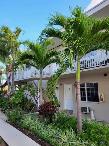 a house view with a garden space