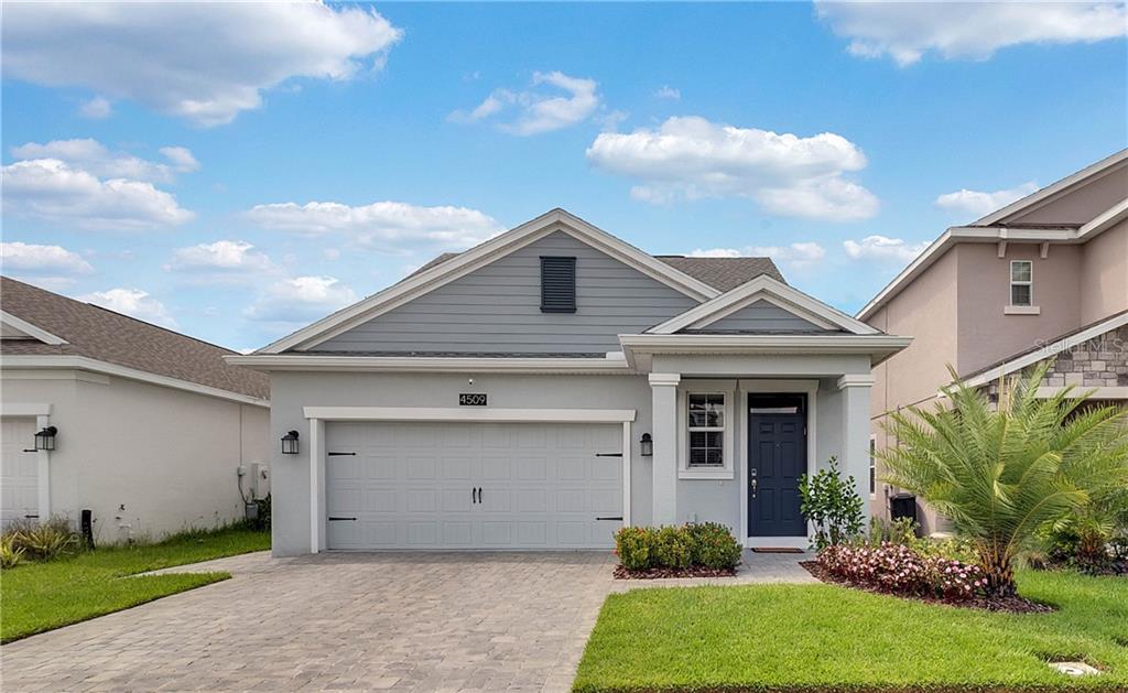 4509 Sequel Road Kissimmee, FL 34746 - Photo 1 of 1 a view of a yard in front of a house