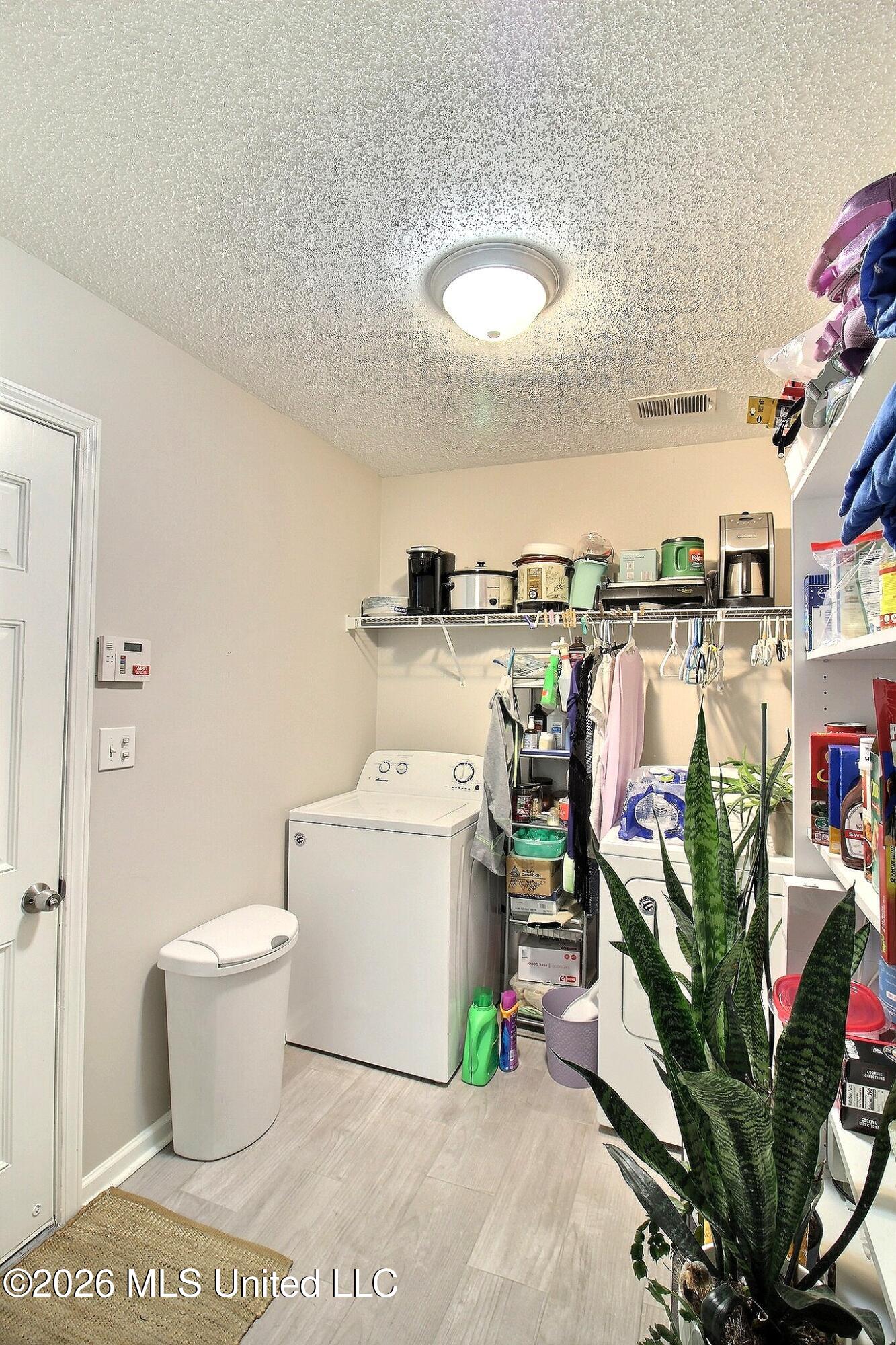 6430 Sandbourne West Olive Branch, MS 38654 - Photo 15 of 26 Laundry Room