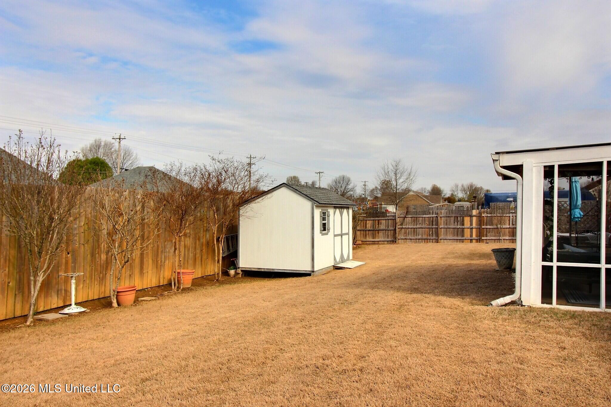 6430 Sandbourne West Olive Branch, MS 38654 - Photo 21 of 26 Large Backyard and Storage Shed