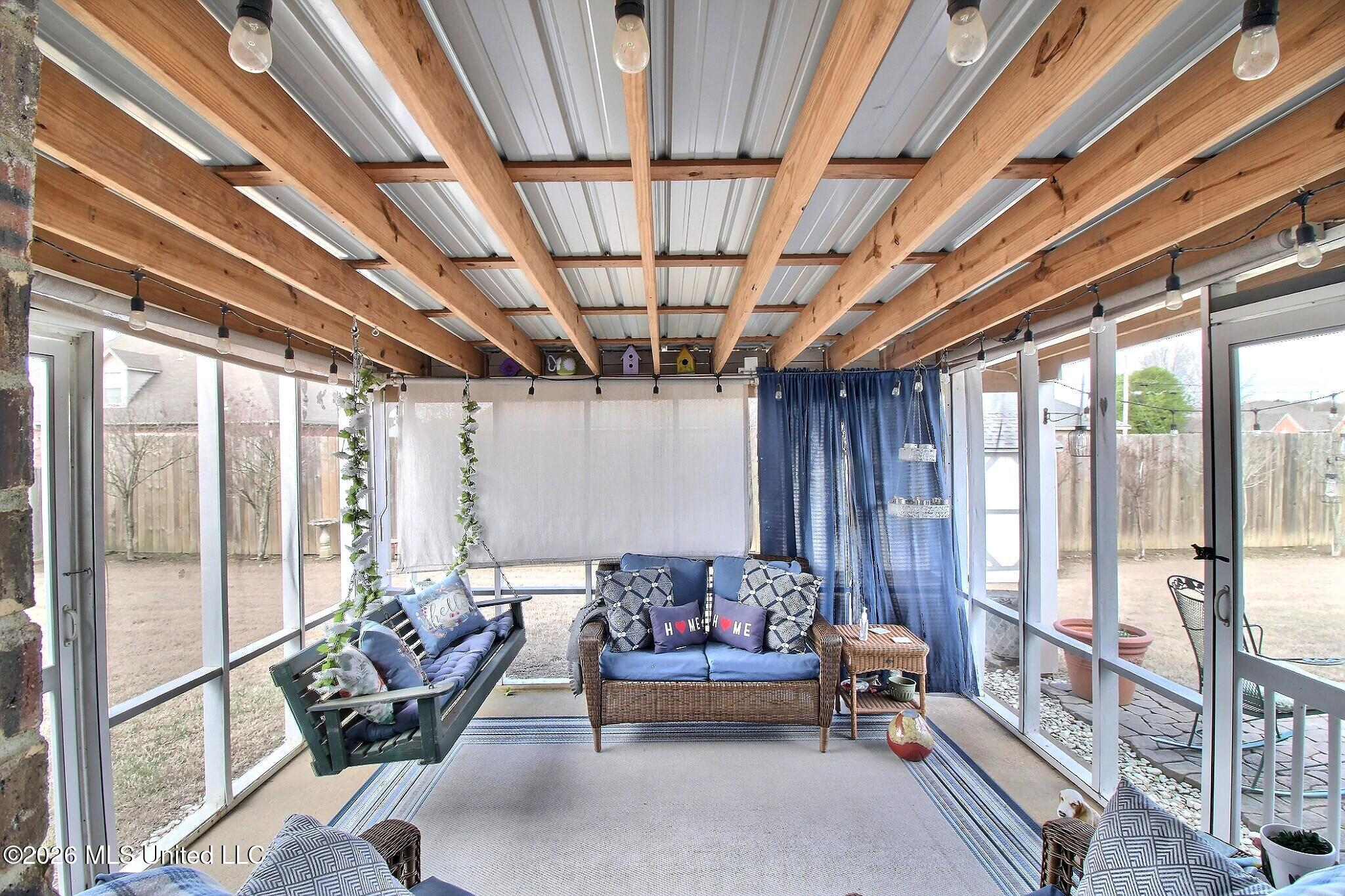 6430 Sandbourne West Olive Branch, MS 38654 - Photo 3 of 26 Relaxing Screened-In Porch