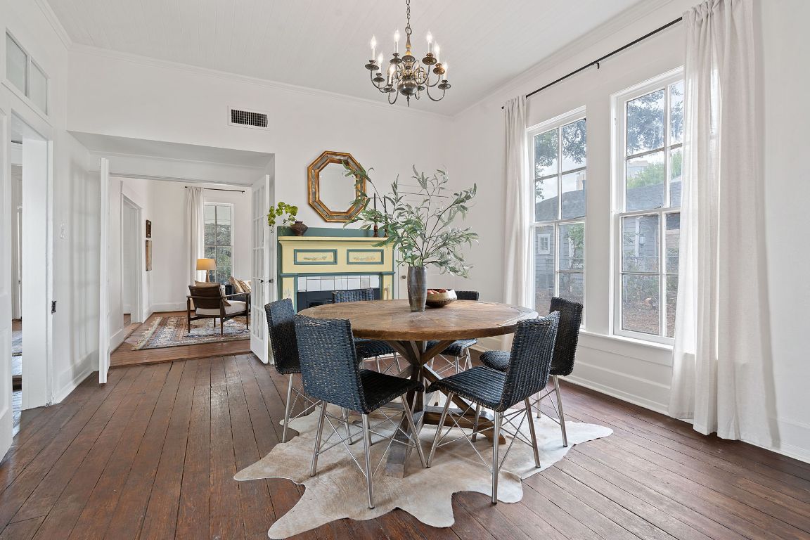 810 East 13th Street Austin, TX 78702 - Photo 12 of 39 a view of a dining room with furniture window and wooden floor
