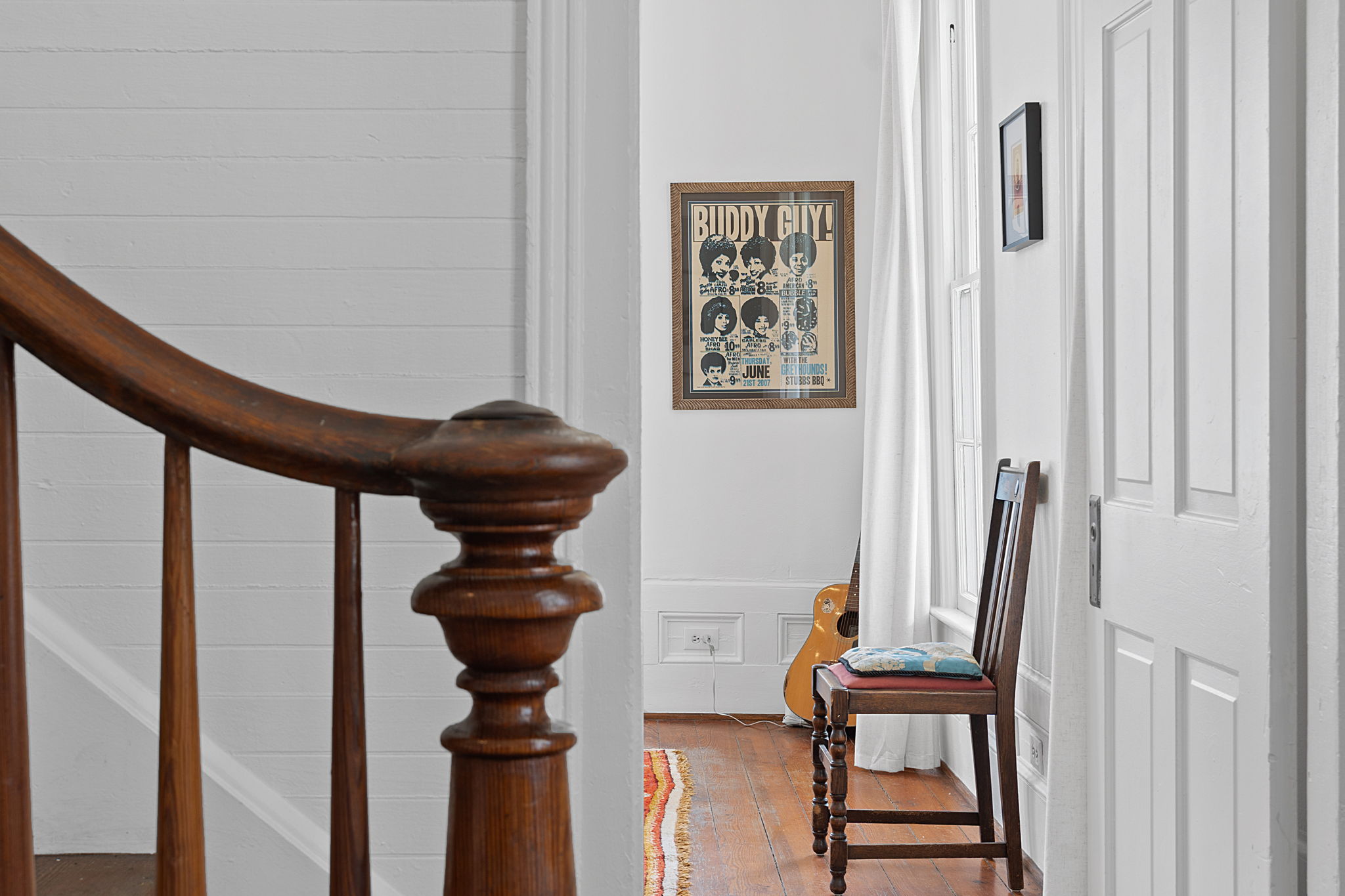 810 East 13th Street Austin, TX 78702 - Photo 17 of 39 a view of a hallway with furniture and wooden floor