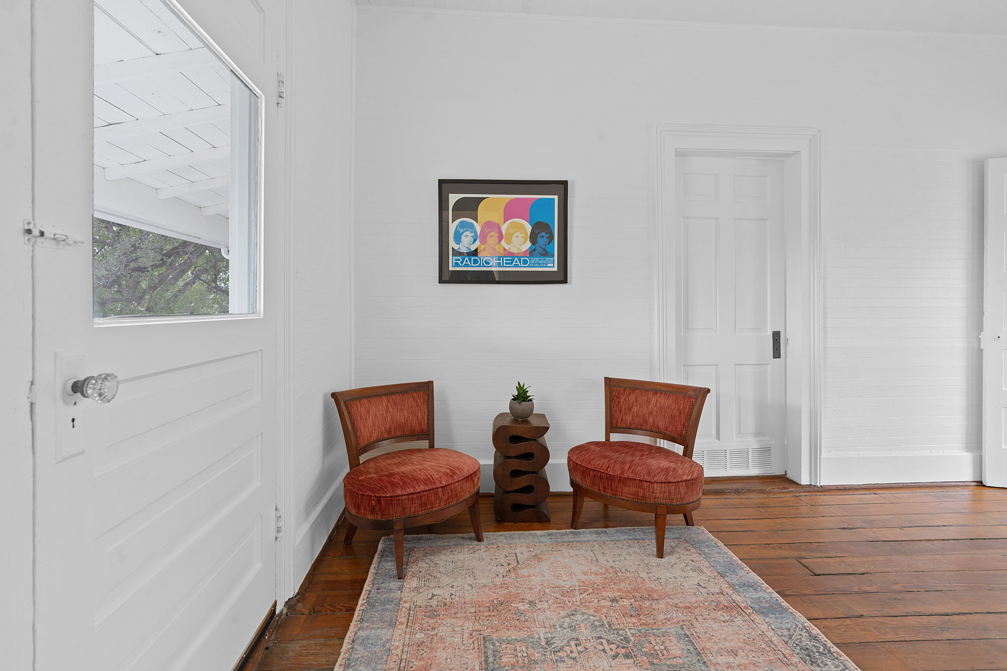 810 East 13th Street Austin, TX 78702 - Photo 19 of 39 a couple of chairs sitting in a room with furniture and a rug