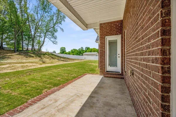 a view of a backyard with a garden