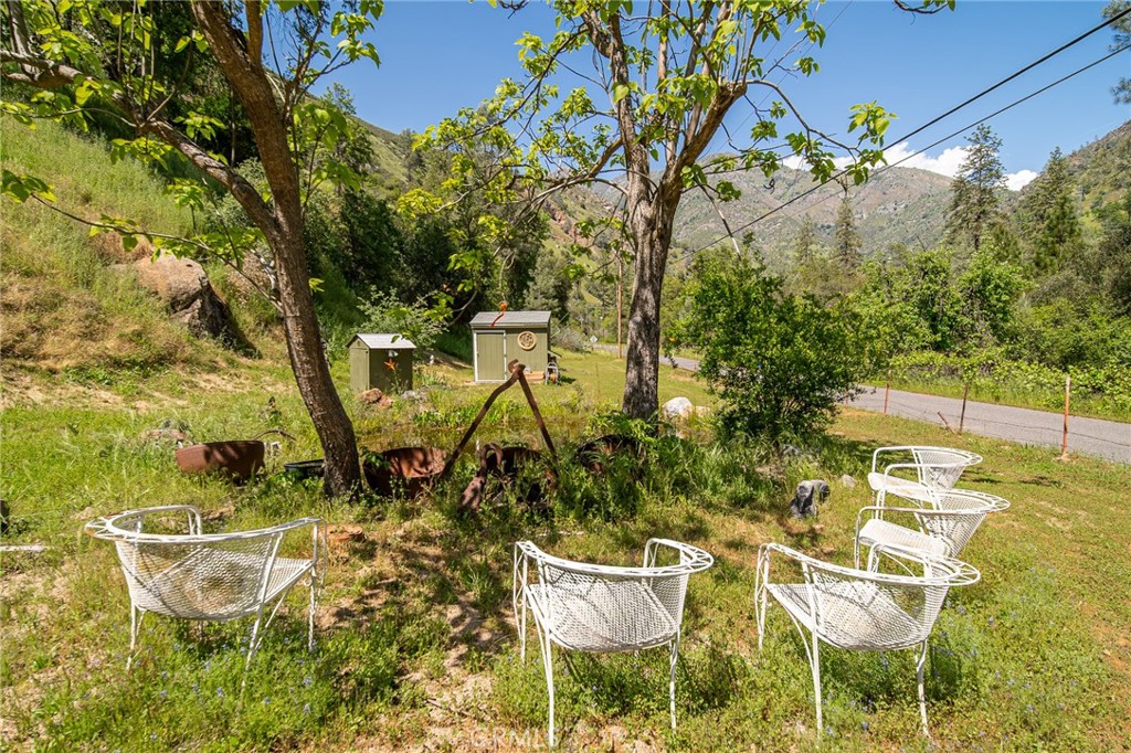 10049 Incline Road El Portal, CA 95318 - Photo 24 of 44 a view of a chairs and table in the patio