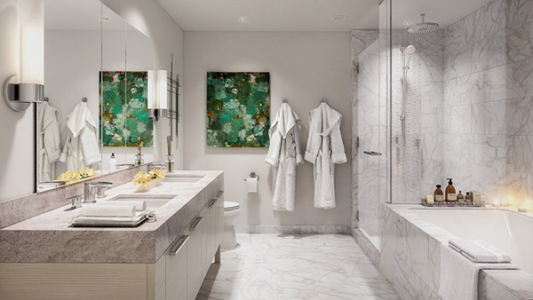 1 Franklin Street, Unit 3903 Boston, MA 02110 - Photo 6 of 26 a bathroom with a double vanity sink a mirror and a bathtub
