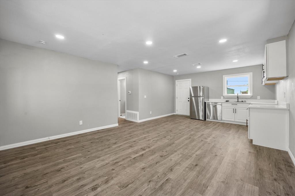 445 Canal Street Quinlan, TX 75474 - Photo 4 of 23 a view of kitchen with wooden floor