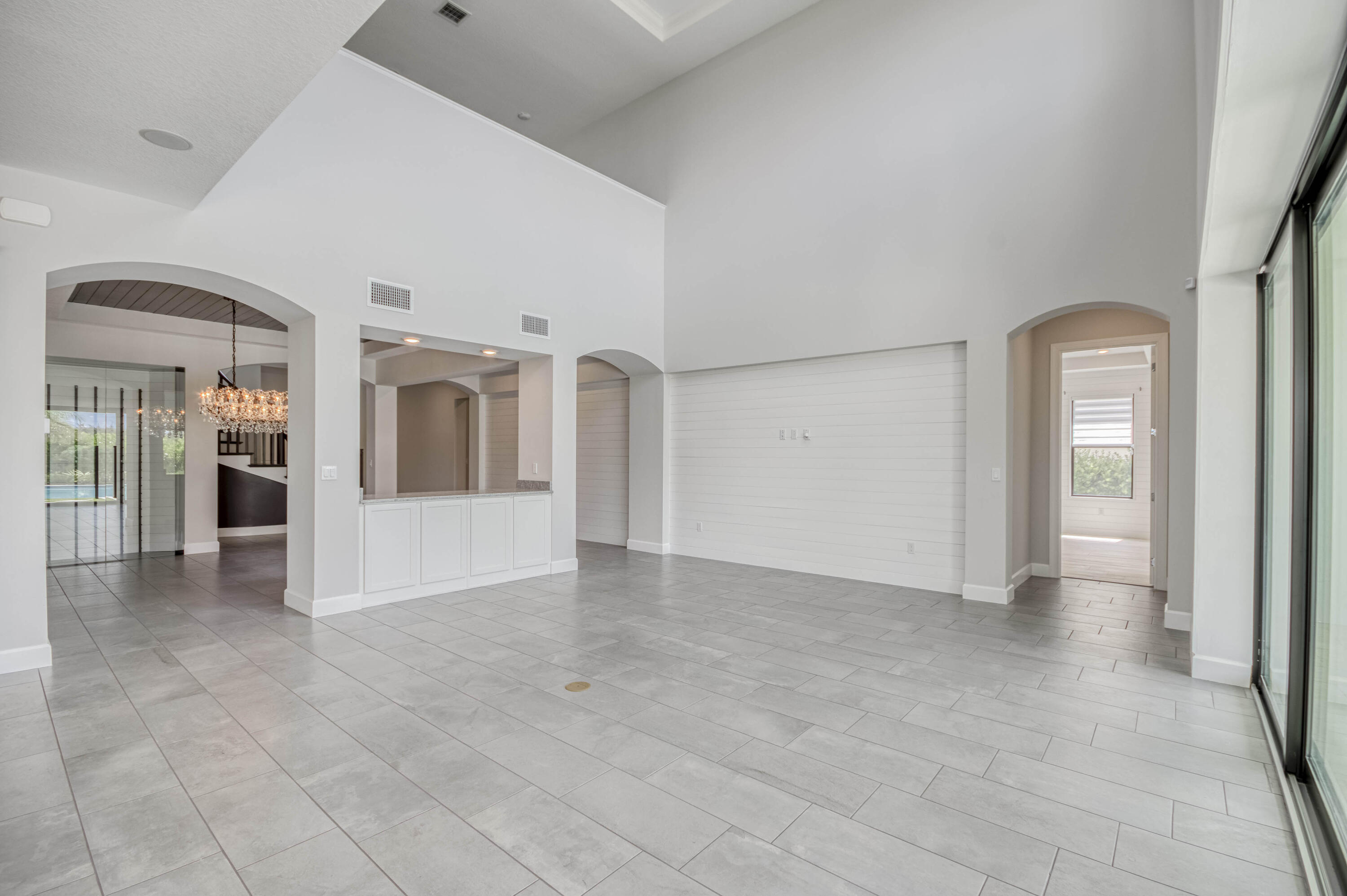 102 Cerulean Key Way Jupiter, FL 33478 - Photo 18 of 85 a view of a hallway with wooden shelves