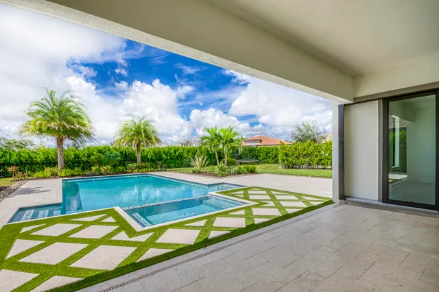 a bedroom with furniture and a wooden floor