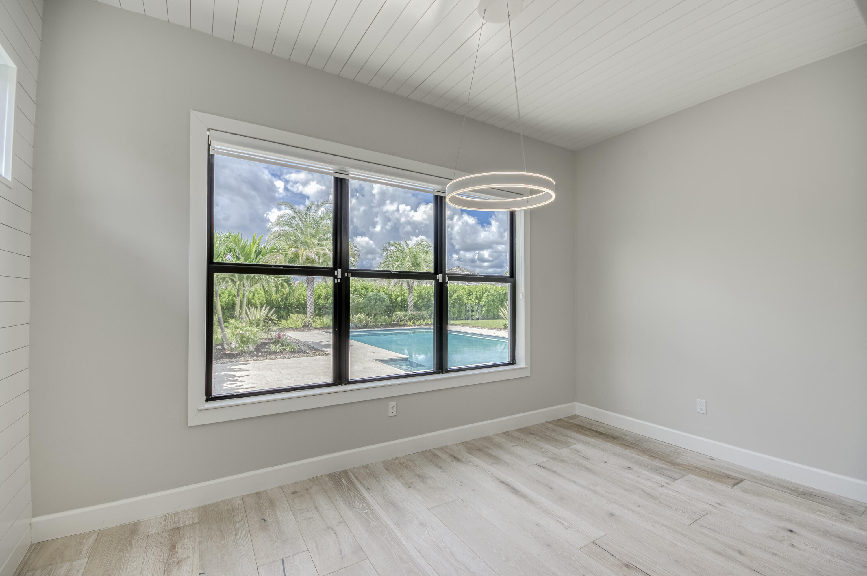 102 Cerulean Key Way Jupiter, FL 33478 - Photo 25 of 85 an empty room with a window