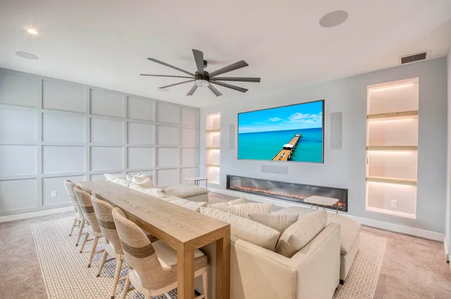 a front view of house with yard and outdoor seating