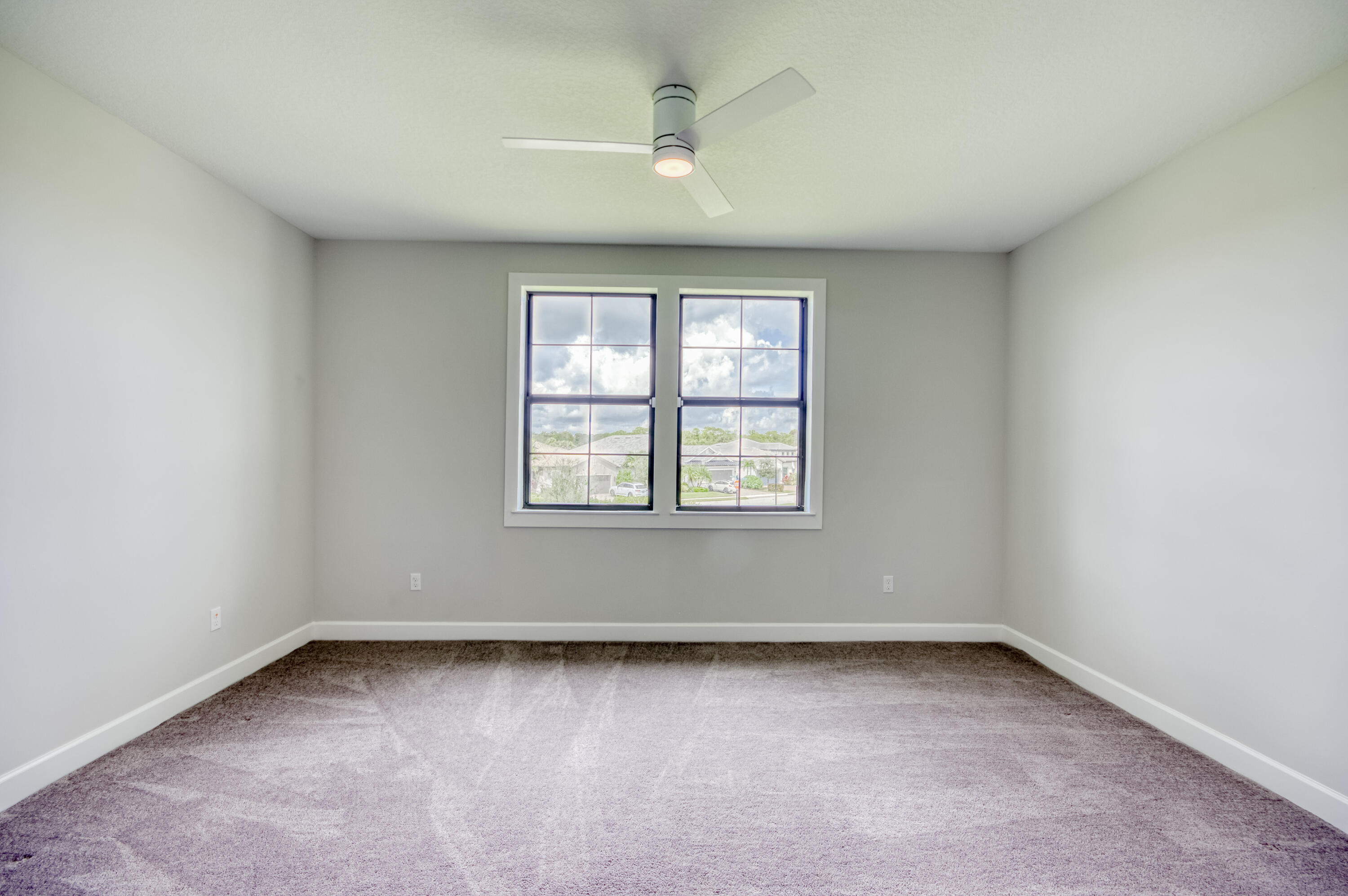 102 Cerulean Key Way Jupiter, FL 33478 - Photo 49 of 85 an empty room with a window