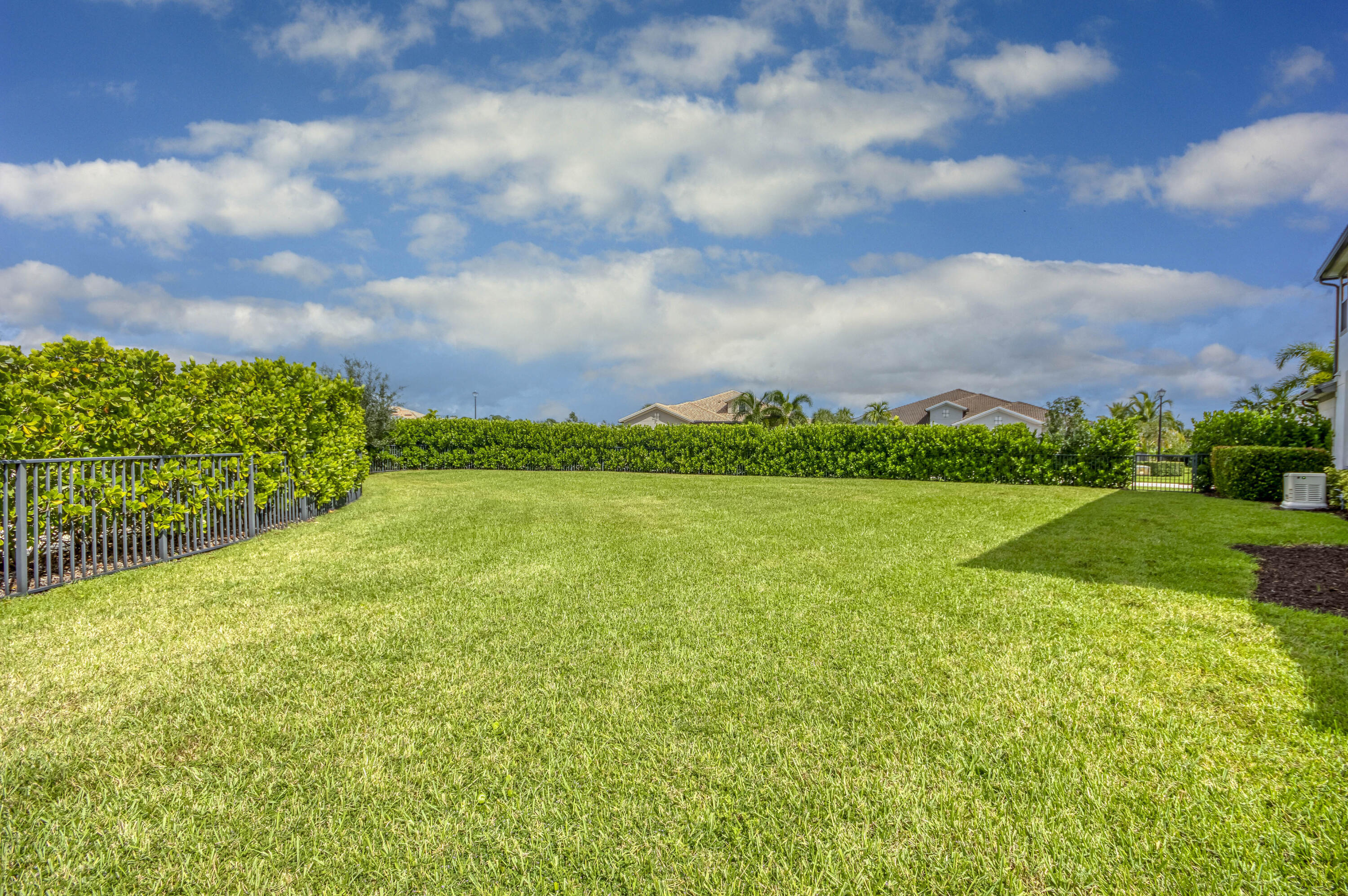102 Cerulean Key Way Jupiter, FL 33478 - Photo 71 of 85 a view of a green field with clear sky
