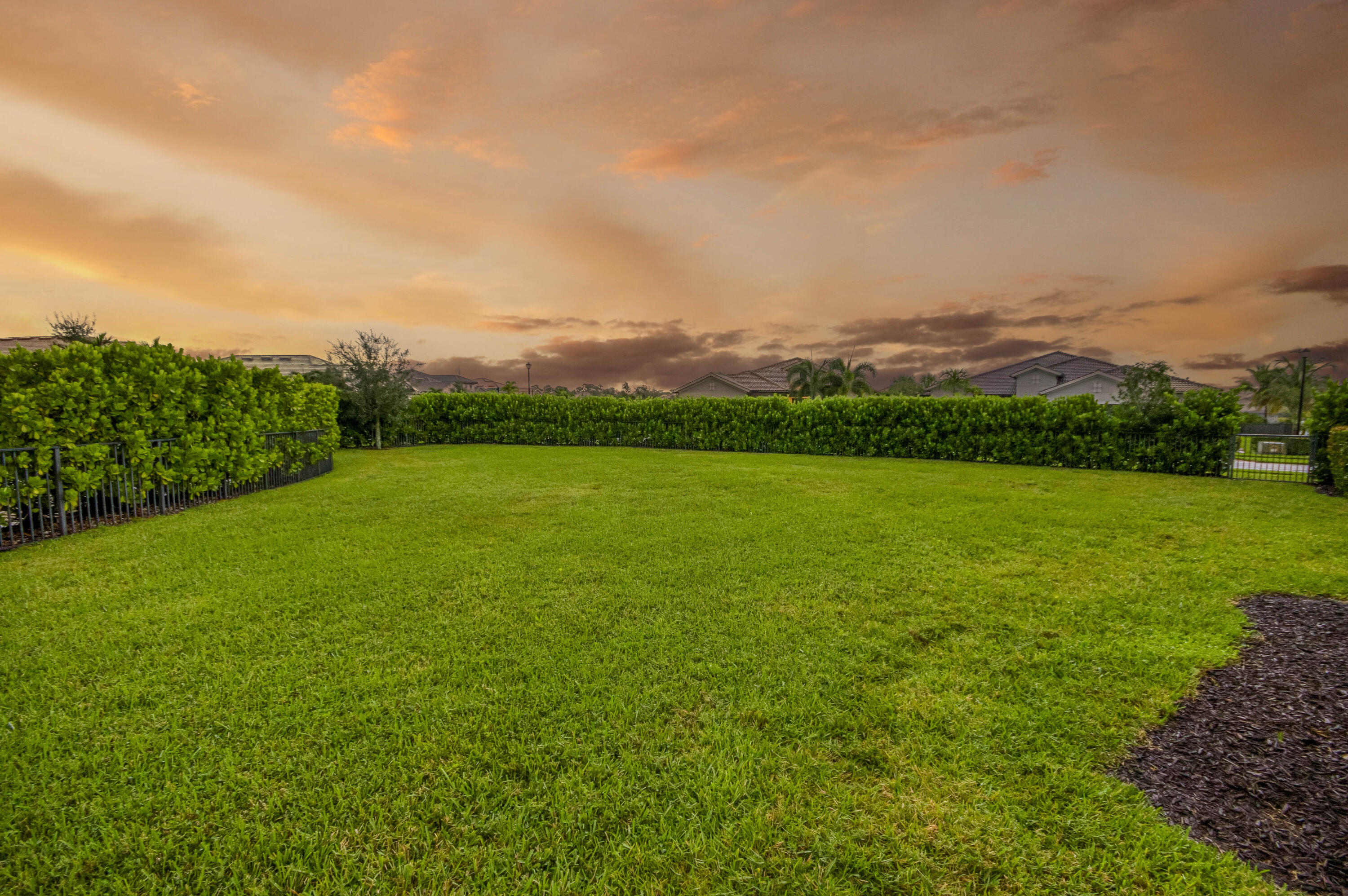 102 Cerulean Key Way Jupiter, FL 33478 - Photo 73 of 85 a view of a green field with clear sky