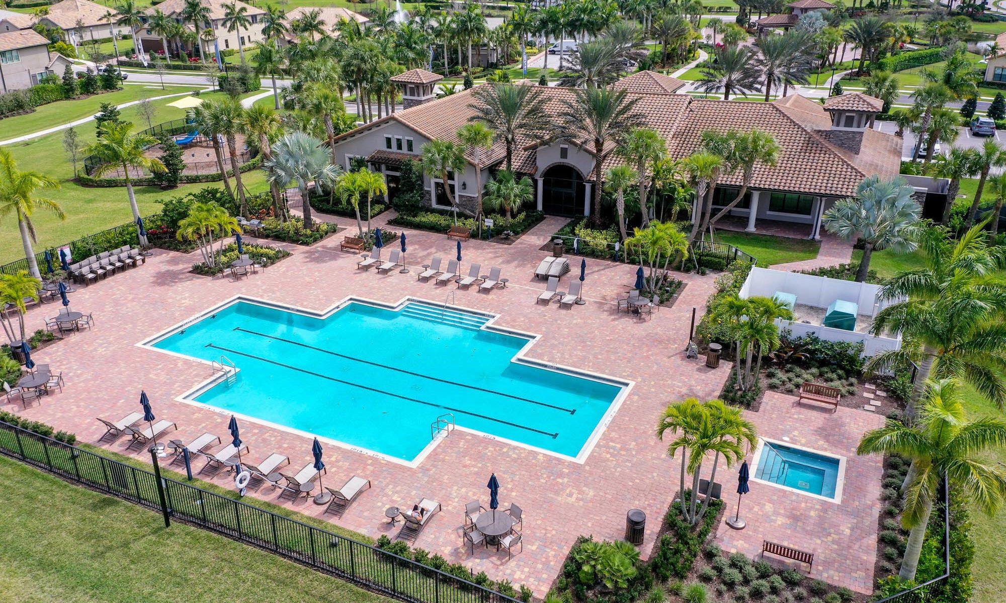 102 Cerulean Key Way Jupiter, FL 33478 - Photo 77 of 85 an aerial view of a house with a garden