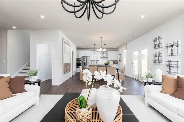 a living room with furniture and a table